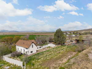 Drone / aerial view with a rural view and a mountain view