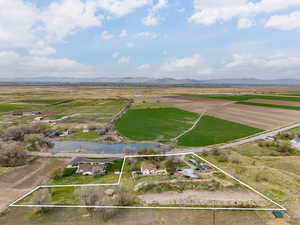 Birds eye view of property featuring a rural view and a water and mountain view