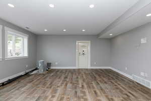 Large living room with access to walk in safe.