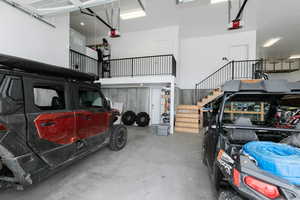 Garage featuring a garage door opener
