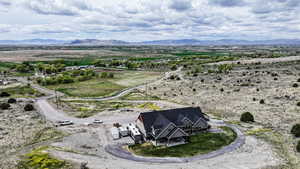 Aerial view of sparsely populated area featuring a mountain backdrop