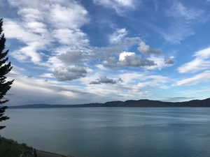 Property view of water with a mountain view