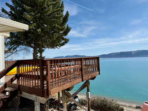 Exterior space featuring a water and mountain view