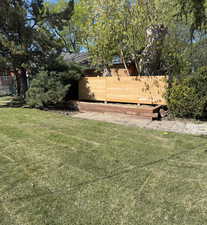 View of yard with fence