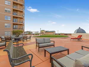 View of patio with an outdoor living space