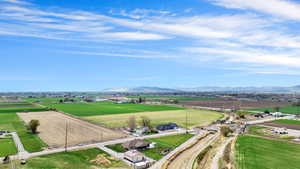 Drone / aerial view with a mountain view and a rural view