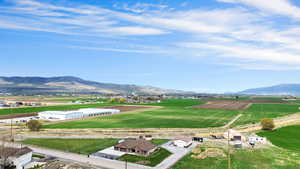 Aerial view with a rural view and a mountain view