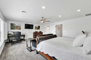 Bedroom featuring recessed lighting, carpet floors, visible vents, and ceiling fan