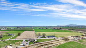 Birds eye view of property featuring a rural view and a mountain view