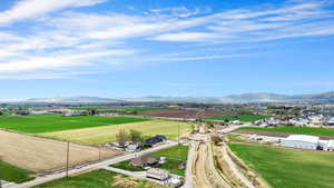 Drone / aerial view with a mountain view and a rural view