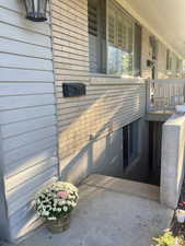 View of property exterior with covered porch