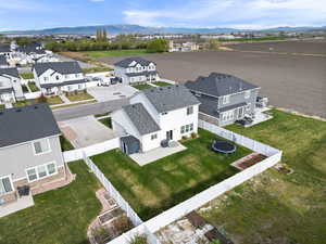 Drone / aerial view with a residential view and a mountain view