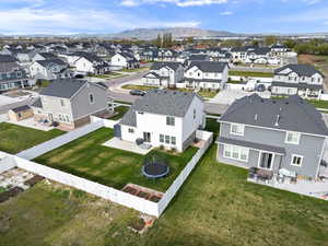 Drone / aerial view with a residential view and a mountain view