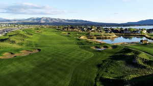 Drone / aerial view with a water and mountain view and view of golf course picture courtesy of Saratoga Springs HOA