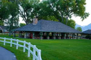 View of home's community with a gazebo, a lawn, and fence picture courtesy of Saratoga Springs HOA