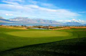 View of home's community featuring a water and mountain view and view of golf course picture courtesy of Saratoga Springs HOA