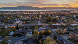 Drone / aerial view with a residential view and a mountain view