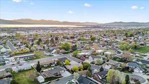 Drone / aerial view featuring a residential view and a mountain view