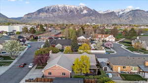 Birds eye view of property featuring a residential view and a mountain view