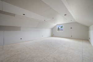 Bonus room featuring lofted ceiling