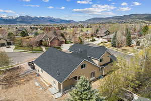 Birds eye view of property featuring a mountain view and a residential view