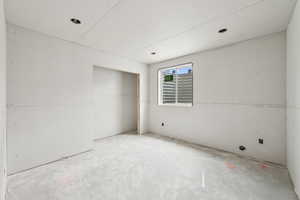 Interior space with concrete floors and a closet