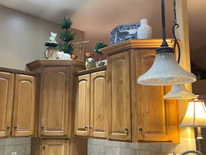 Bar featuring tasteful backsplash