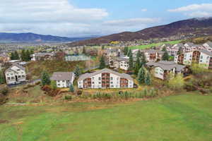 Birds eye view of property featuring a residential view and a mountain view