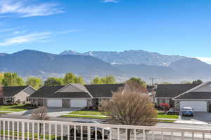 Patio Mountain view featuring a residential view