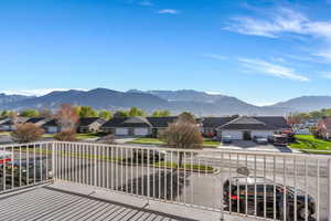 Patio Balcony featuring a residential view and a mountain view