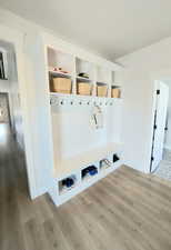 Mud area with hooks/bins