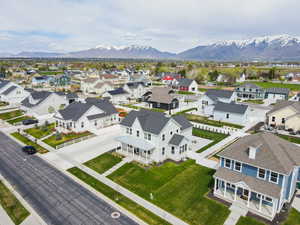 Birds eye view of property featuring a residential view and a mountain view