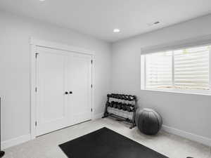 Basement bedroom currently used as exercise room