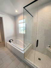 Separate Euro shower and soaking bathtub