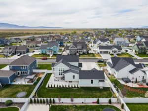 Aerial view featuring a mountain view and a residential view