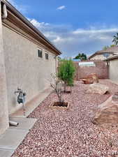 View of fenced backyard