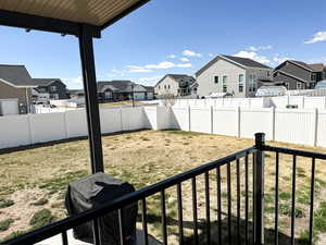 View of yard with a residential view and a fenced backyard