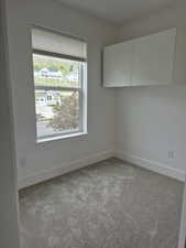 This closet with lots of natural light and mountain views was used as a sewing room