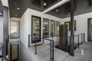 Exterior space w 2 story water feature