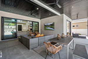 View of patio / terrace with ceiling fan and outdoor lounge area