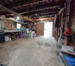 Garage featuring a workshop area