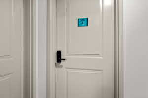 Door A to  main living space from shared entrance of 301