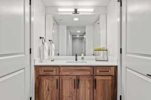 Bedroom 2 attached bathroom with large vanity