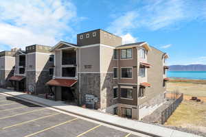 Lake Residences Building E with a Bear Lake view and uncovered parking