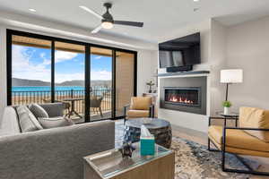 Living room featuring electric fireplace and a Bear Lake view