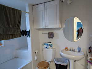 Full bathroom with shower / bathtub combination and toilet