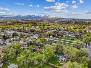 Drone / aerial view with a residential view and a mountain view