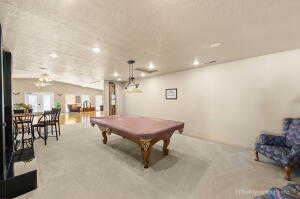 Game room with recessed lighting, carpet floors, ceiling fan, billiards, and lofted ceiling