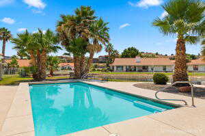 Outdoor pool with a patio