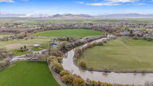 Bird's eye view with a rural view and a water and mountain view